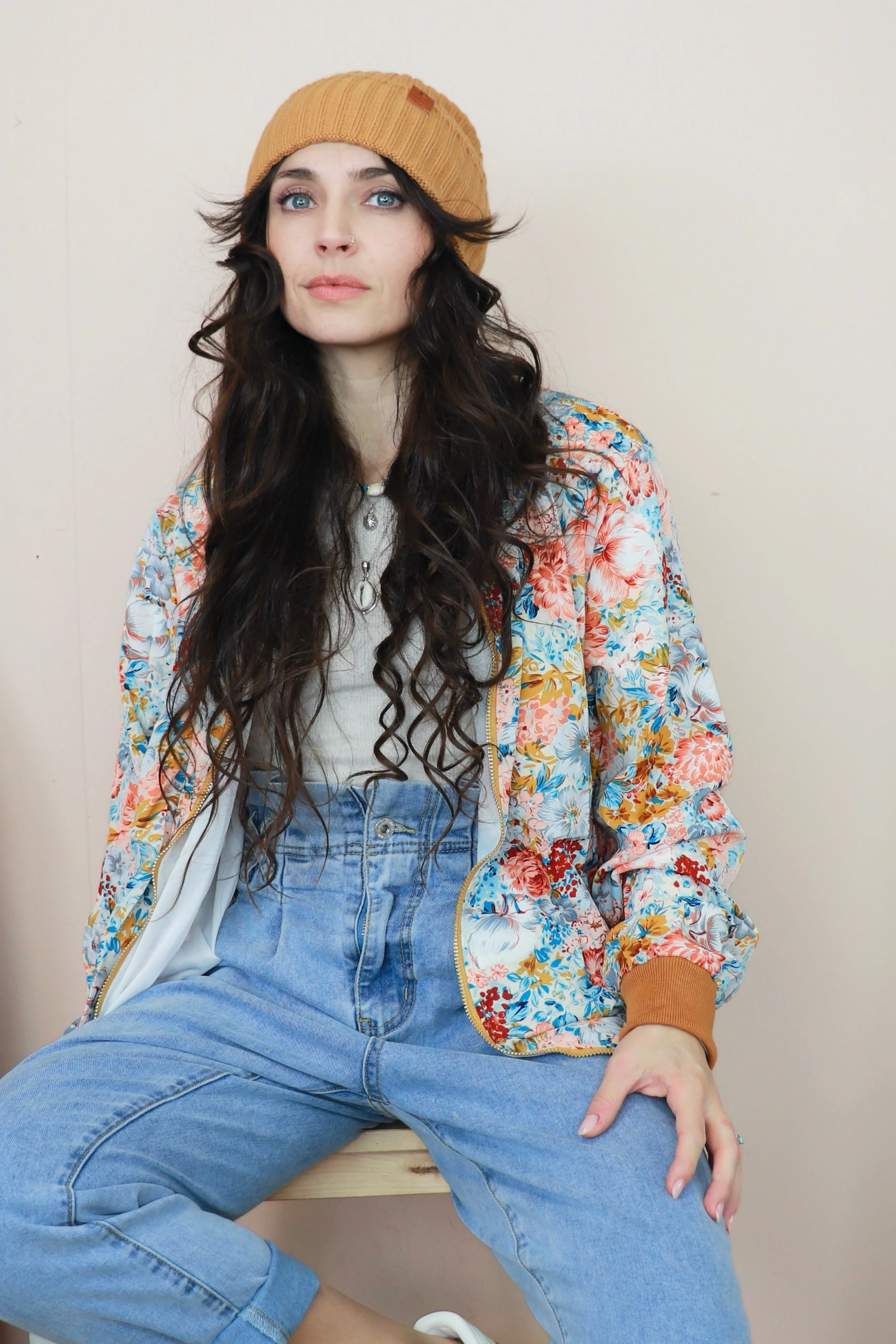 Floral bomber jacket with rust trim